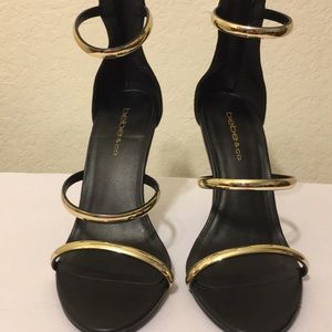 Classy Black/Gold Bebe high heels.